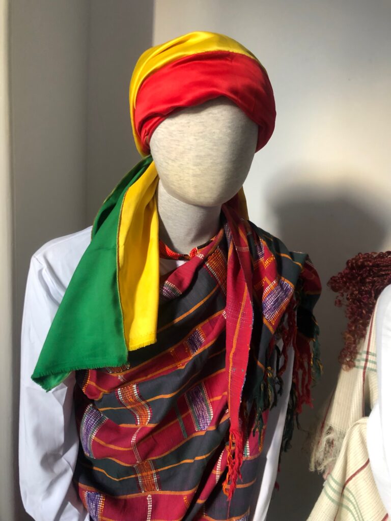 Traditional colourful scarf on a mannequin