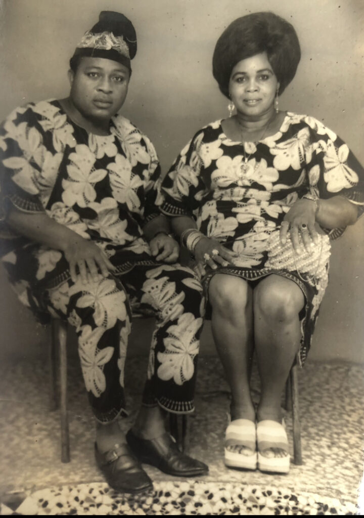 John's parents sitting down for a a formal photograph